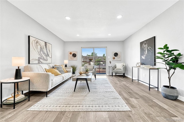 living room with light hardwood / wood-style floors