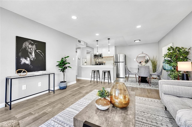 living room featuring light hardwood / wood-style flooring