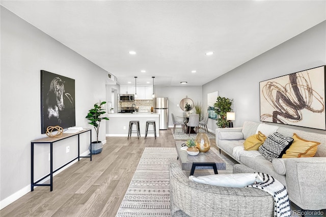 living room featuring light wood-type flooring