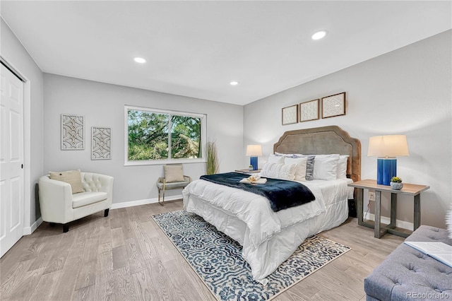 bedroom featuring light hardwood / wood-style flooring