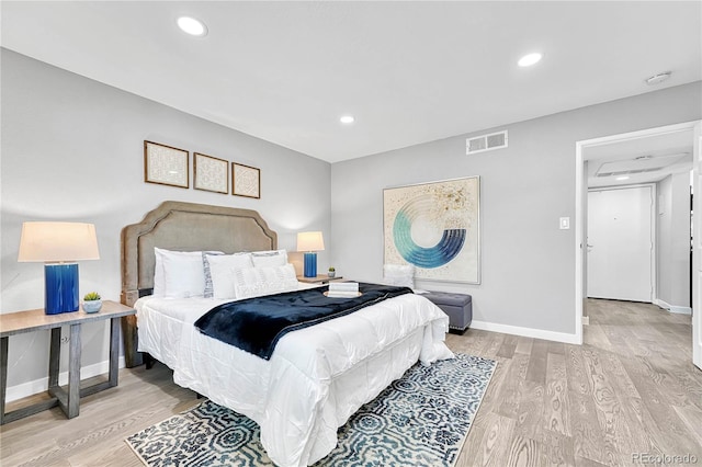 bedroom with light wood-type flooring