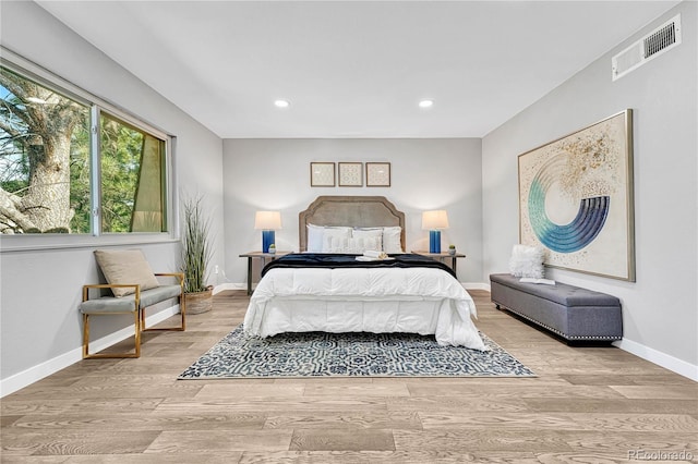 bedroom with light wood-type flooring