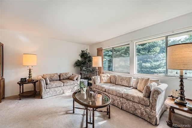 13934 W Warren Dr, Lakewood, CO 80228 - living room with healthy amount of natural light and light carpet