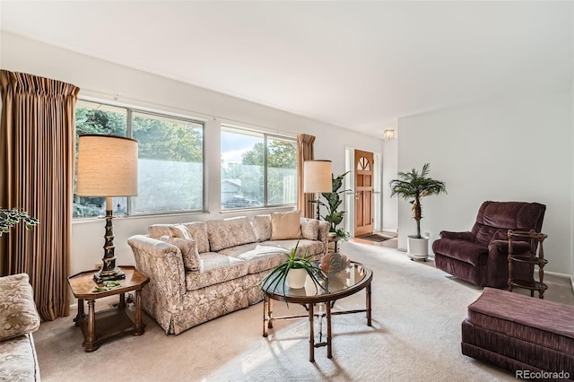 13934 W Warren Dr, Lakewood, CO 80228 - carpeted living room featuring plenty of natural light