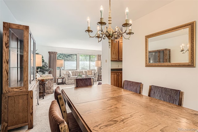 13934 W Warren Dr, Lakewood, CO 80228 - dining room with a chandelier and light colored carpet
