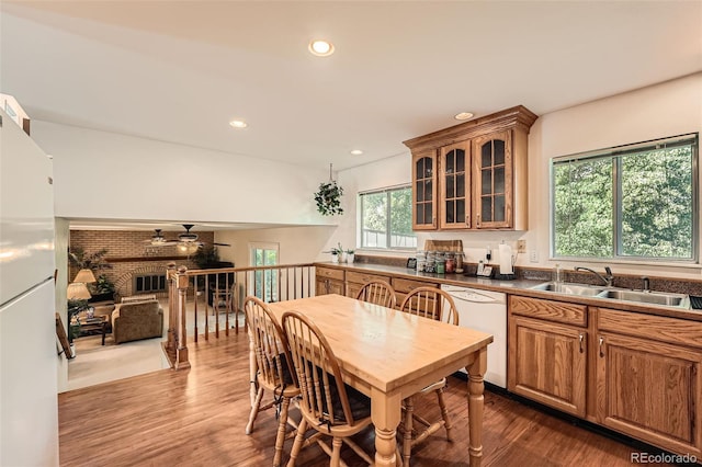 13934 W Warren Dr, Lakewood, CO 80228 - kitchen with white appliances, ceiling fan, glass insert cabinets, dark wood-style floors, and recessed lighting