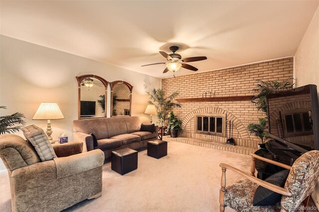 13934 W Warren Dr, Lakewood, CO 80228 - carpeted living room with a fireplace, ceiling fan, and brick wall