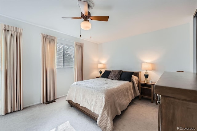 13934 W Warren Dr, Lakewood, CO 80228 - bedroom with light carpet and a ceiling fan