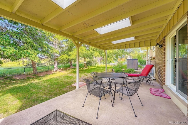 13934 W Warren Dr, Lakewood, CO 80228 - view of patio with outdoor dining area