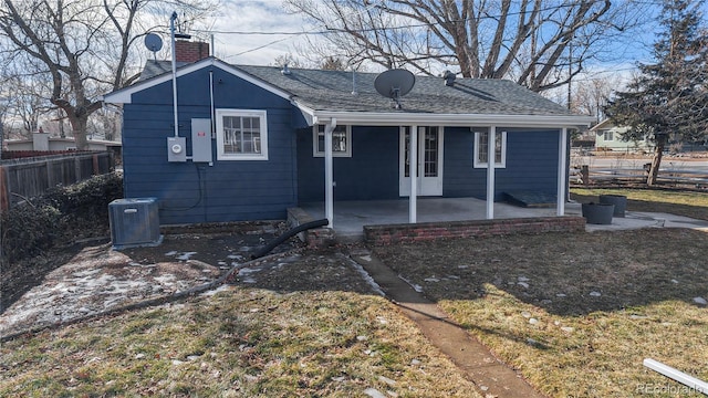 back of house with a patio area and central air condition unit