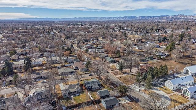 birds eye view of property featuring a mountain view