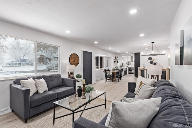 living room with light hardwood / wood-style floors