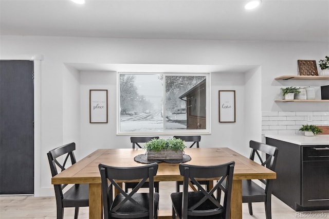 dining room with light hardwood / wood-style floors