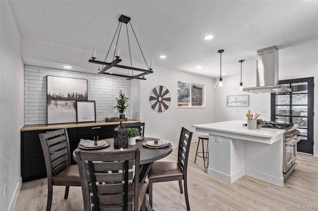 dining room with light hardwood / wood-style floors