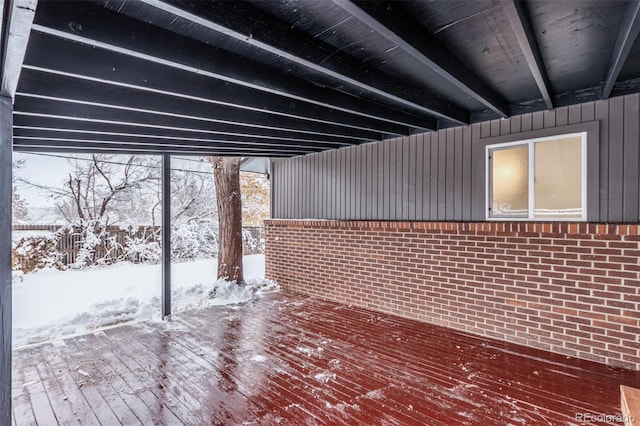 view of snow covered deck