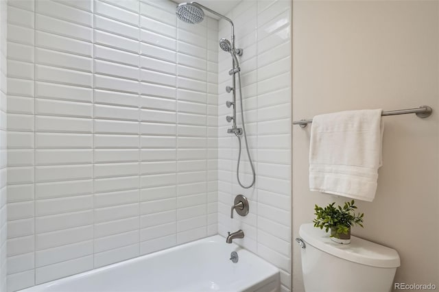 bathroom with toilet and shower / tub combination