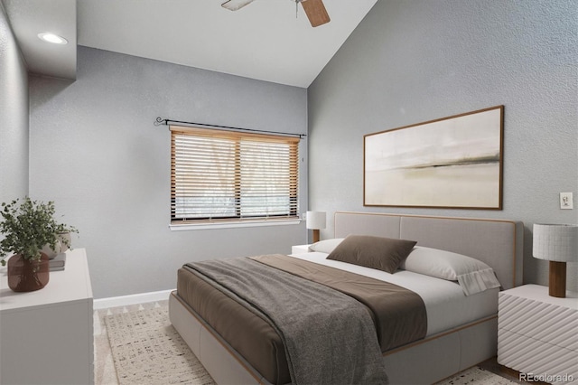 bedroom featuring vaulted ceiling and ceiling fan