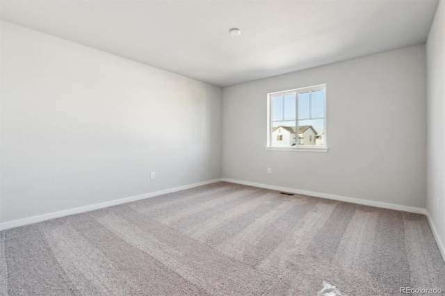 spare room with carpet flooring