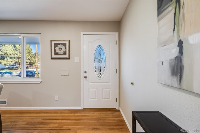 foyer with hardwood / wood-style flooring