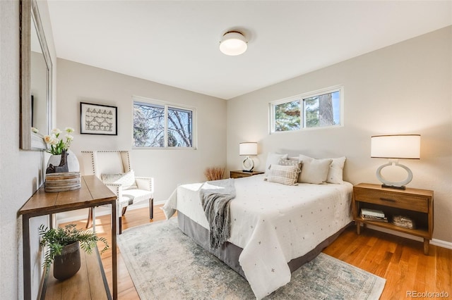 bedroom featuring light wood-type flooring