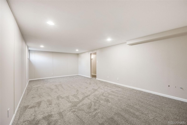 basement featuring carpet flooring