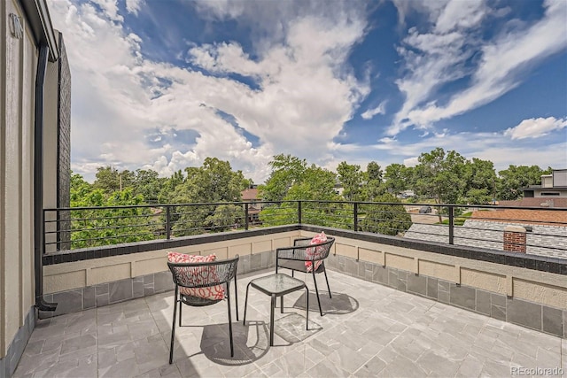 view of patio / terrace featuring a balcony