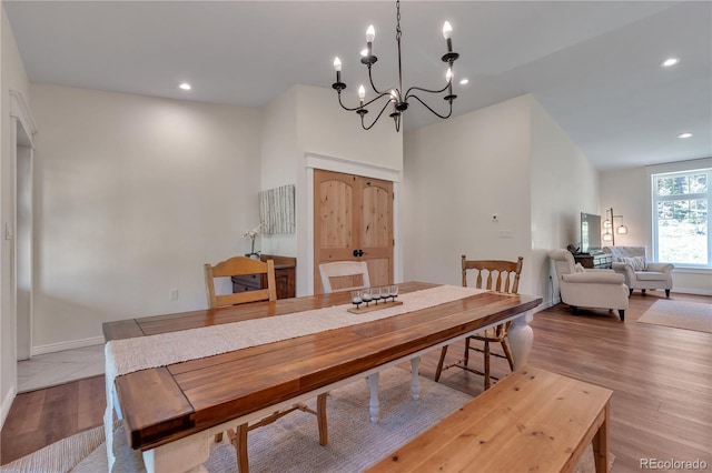 19745 Hopi Pines Grv, Peyton, CO 80831 - dining area featuring wood finished floors, a chandelier, and recessed lighting