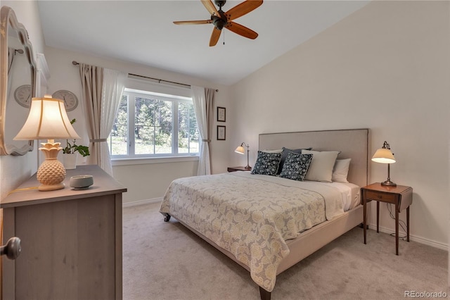 19745 Hopi Pines Grv, Peyton, CO 80831 - bedroom with lofted ceiling, light carpet, and ceiling fan