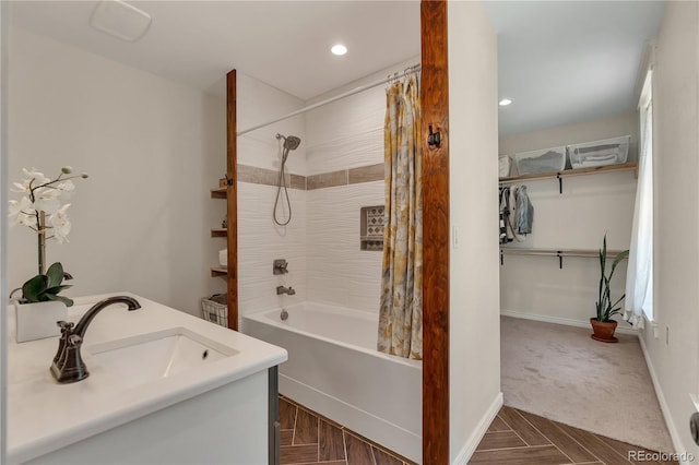 19745 Hopi Pines Grv, Peyton, CO 80831 - bathroom featuring shower / bathtub combination with curtain, vanity, and recessed lighting