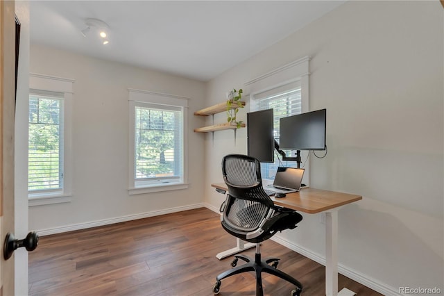 19745 Hopi Pines Grv, Peyton, CO 80831 - home office featuring healthy amount of natural light and wood finished floors
