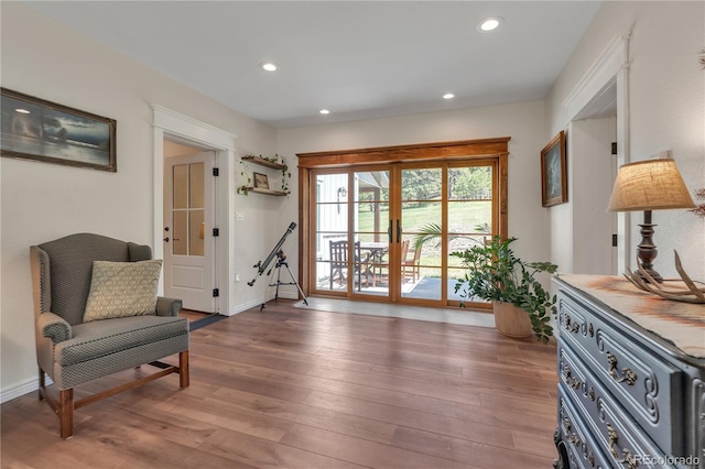 19745 Hopi Pines Grv, Peyton, CO 80831 - sitting room featuring light wood-type flooring and recessed lighting