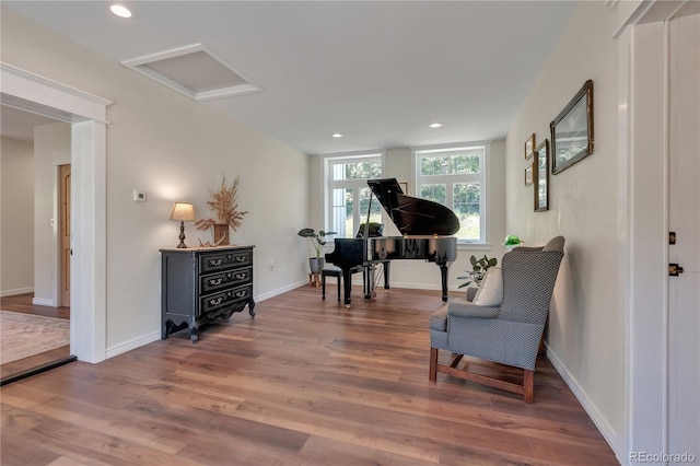 19745 Hopi Pines Grv, Peyton, CO 80831 - living area featuring attic access, wood finished floors, and recessed lighting