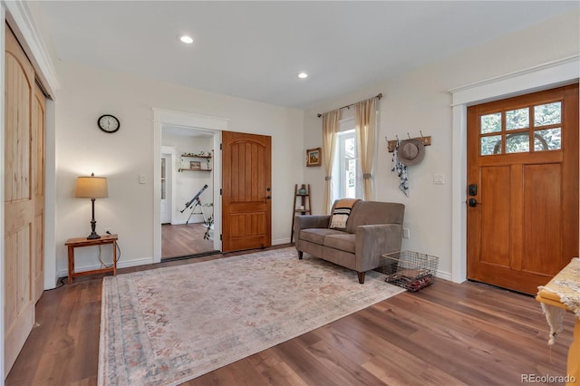 19745 Hopi Pines Grv, Peyton, CO 80831 - entryway with healthy amount of natural light, wood finished floors, and recessed lighting