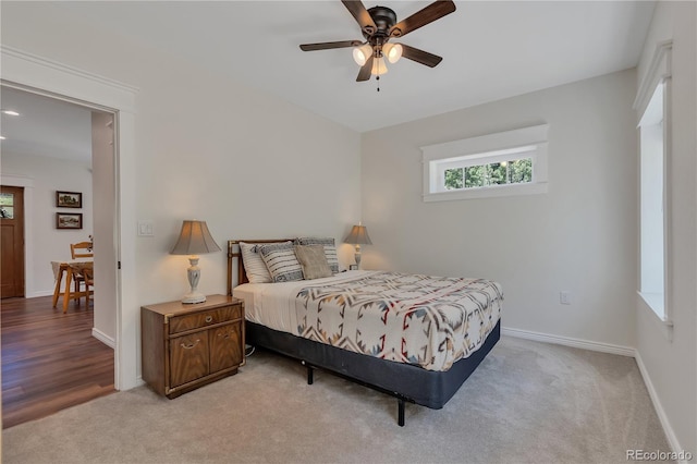 19745 Hopi Pines Grv, Peyton, CO 80831 - bedroom featuring light carpet and ceiling fan