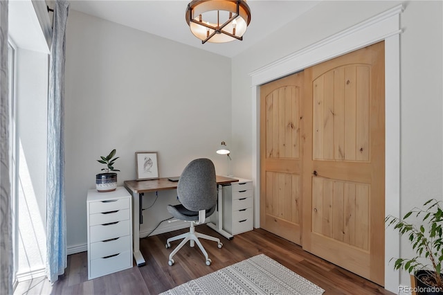 19745 Hopi Pines Grv, Peyton, CO 80831 - office space featuring wood finished floors and a chandelier