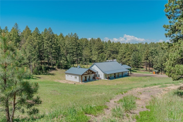 19745 Hopi Pines Grv, Peyton, CO 80831 - aerial view of property and surrounding area with a forest