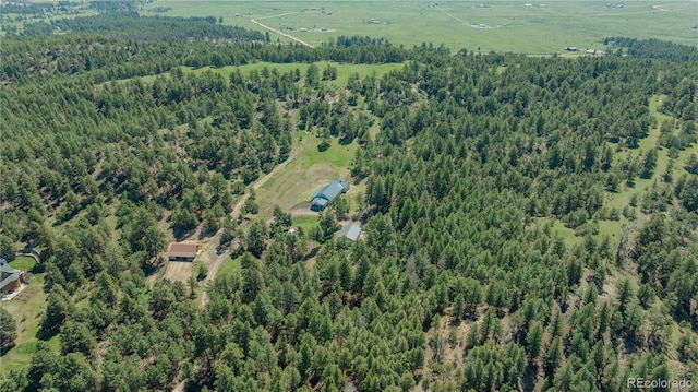 19745 Hopi Pines Grv, Peyton, CO 80831 - aerial view of property and surrounding area with a forest