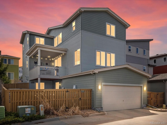 3368 Cranston Cir, Highlands Ranch, CO 80126 - view of front facade with a balcony, driveway, and an attached garage