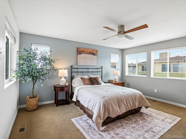 3368 Cranston Cir, Highlands Ranch, CO 80126 - carpeted bedroom with baseboards and a ceiling fan