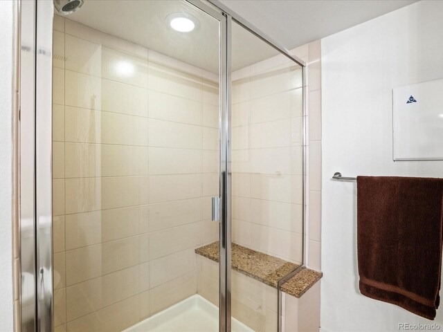 3368 Cranston Cir, Highlands Ranch, CO 80126 - full bathroom with a shower stall and recessed lighting