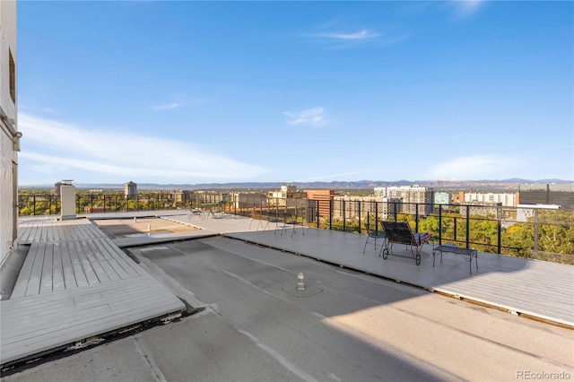 view of patio / terrace featuring a mountain view