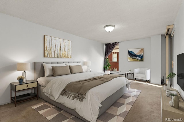 carpeted bedroom featuring a textured ceiling