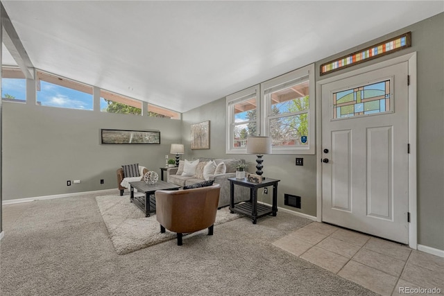 1906 S Vrain St, Denver, CO 80219 - foyer featuring baseboards, lofted ceiling, and light colored carpet