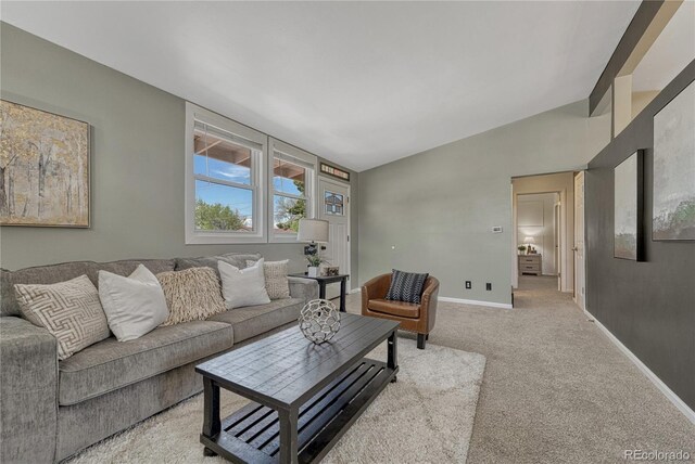 1906 S Vrain St, Denver, CO 80219 - living room with baseboards, light colored carpet, and lofted ceiling