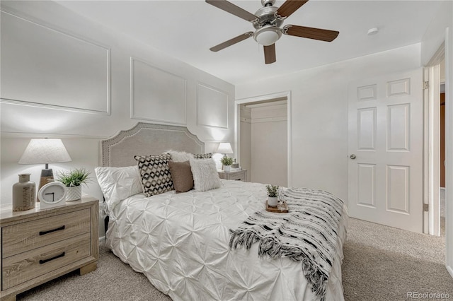 1906 S Vrain St, Denver, CO 80219 - bedroom with light colored carpet, a closet, and ceiling fan
