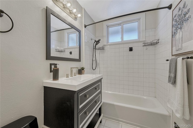 1906 S Vrain St, Denver, CO 80219 - bathroom with shower / bathtub combination, vanity, tile patterned flooring, and a textured wall