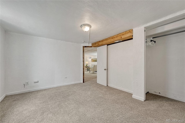 1906 S Vrain St, Denver, CO 80219 - unfurnished bedroom with carpet, baseboards, and a textured ceiling