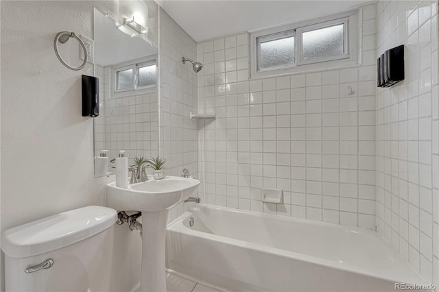 1906 S Vrain St, Denver, CO 80219 - bathroom featuring toilet and shower / washtub combination