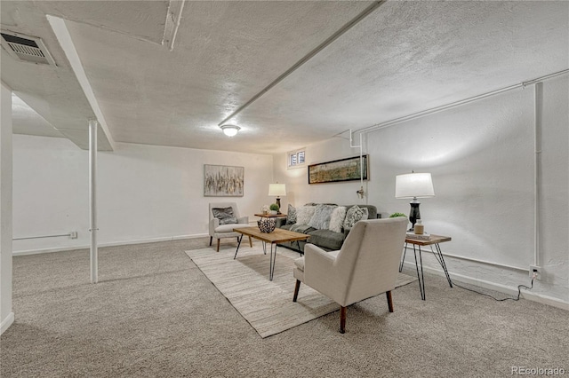 1906 S Vrain St, Denver, CO 80219 - carpeted living area featuring a textured ceiling and baseboards