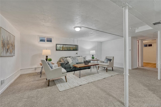 1906 S Vrain St, Denver, CO 80219 - carpeted living area featuring a textured ceiling and baseboards
